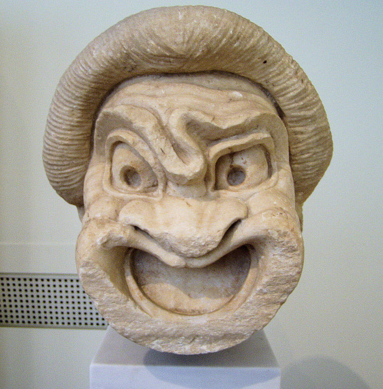 Ilustración de uma máscara de comedia do teatro griego antiguo